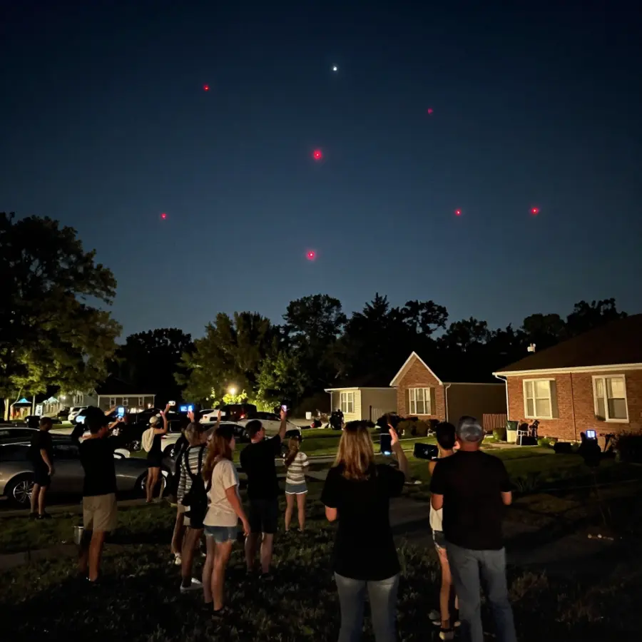 Residents watching mysterious drones from their neighborhood